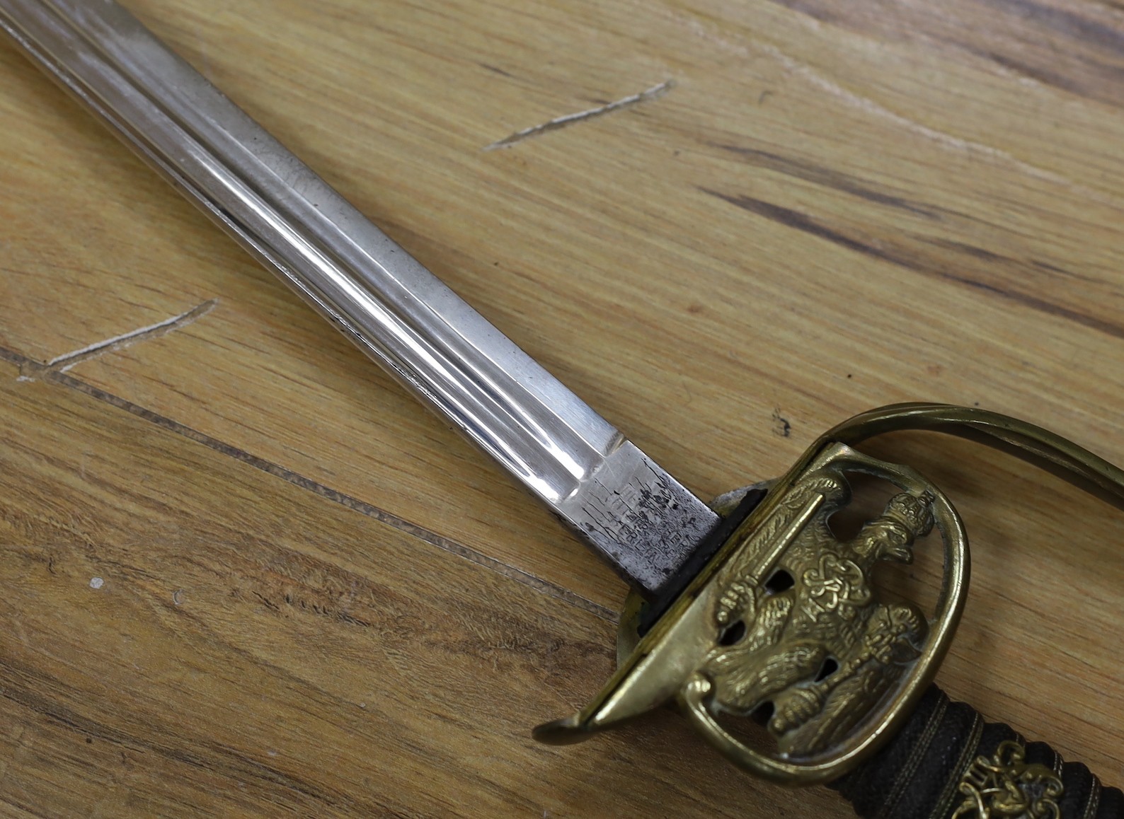 A late 19th century Imperial German/Prussian infantry officer's sabre and scabbard 97cm total length